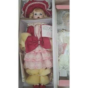 Vintage Design Debut Collectible Porcelain Dolls in Red Dress